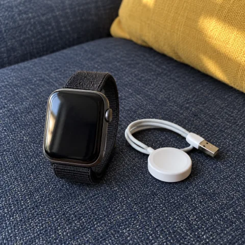 Used smartwatch with charging cable